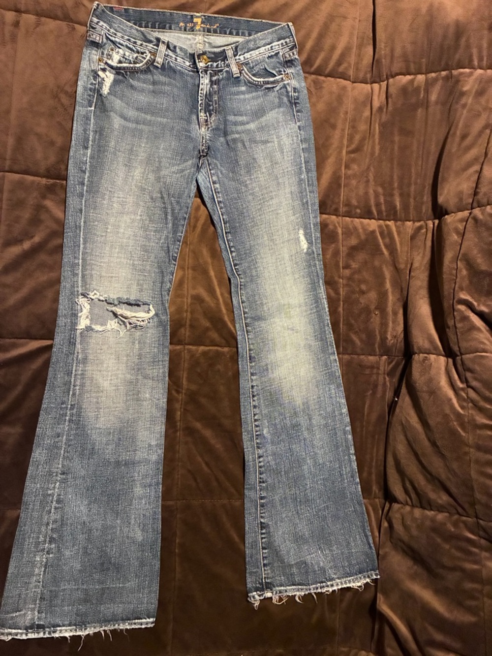 7 for all Mankind brand, size 27, 100% cotton, flare, distressed denim jeans